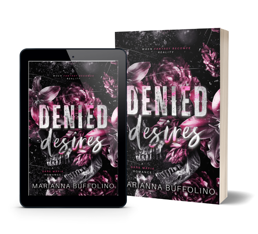 A paperback book and a tablet display the cover of Denied Desires by Marianna Buffolino, featuring dark flowers, a skull, and bold white and pink text. The background is black with purple and pink floral accents.